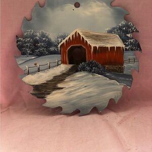 Vin folk art covered bridge in winter.